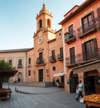 Ugíjar 2 Plaza mayor de Ugíjar con la fachada renacentista de la Colegiata de Nuestra Señora del Martirio y casonas señoriales alpujarreñas